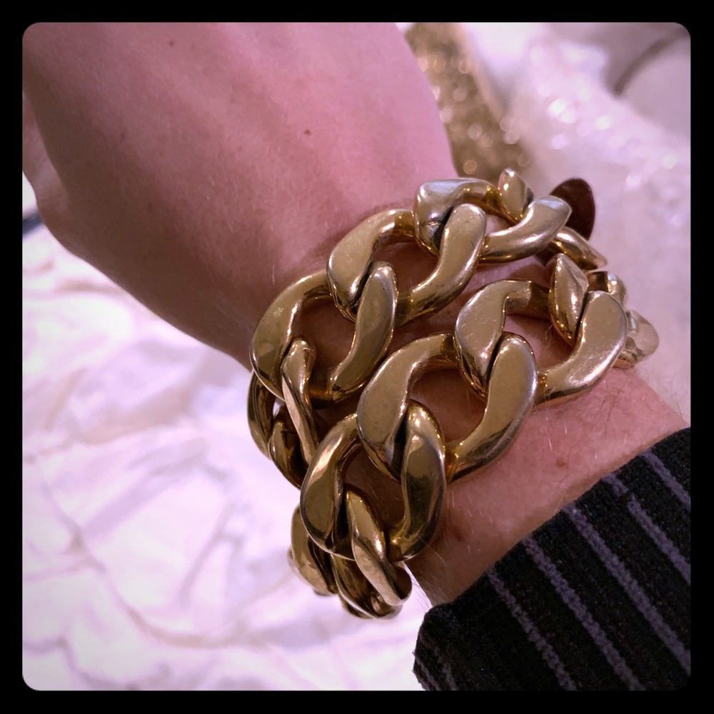 Gold chain link bracelet with leather strap